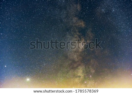 Milky Way, Jupiter and Saturt planets  in the night sky.