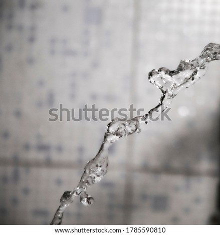 Macro Shot of Water Coming out of the drainage Pipe in home