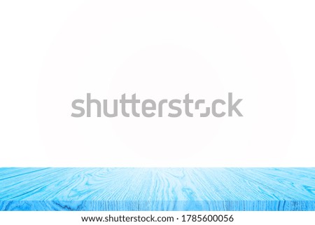 Empty blue wooden table top on white background. For product display or design.