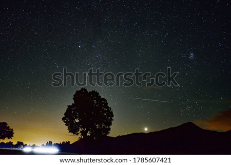 Venus planet and Pleiades in the night sky.