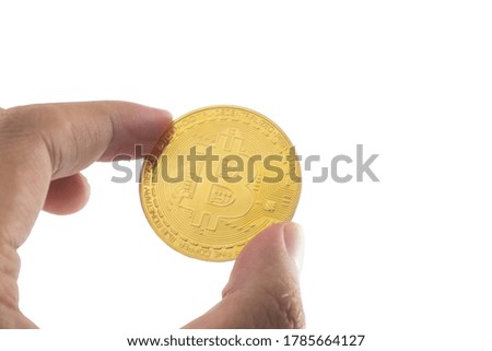 Bitcoin holding in hand isolated on white background with clipping path.