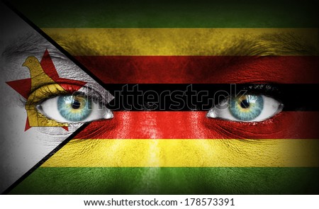 Human face painted with flag of Zimbabwe