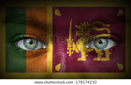 Human face painted with flag of Sri Lanka