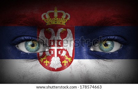 Human face painted with flag of Serbia