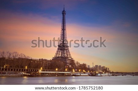  Eiffel tower in Paris, France with Scenic panorama of the river Seine under the twilight skyline with port of Seine river