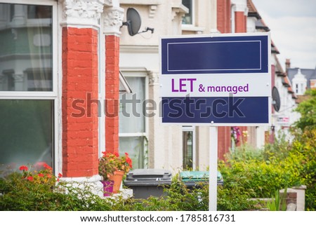 Estate agent sign displayed outside a terraced house in Harringay Ladder, north London