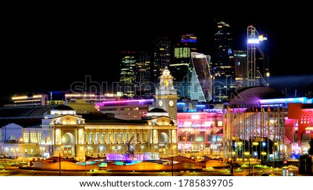 downtown moscow city at night modern architecture landmark with Railway station building against skyscrapers background. Wide panorama