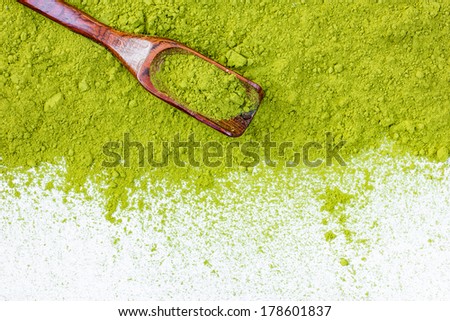 border of powdered green tea top view close up isolated on white background