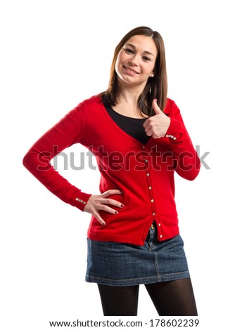Young woman making Ok sign over white background 