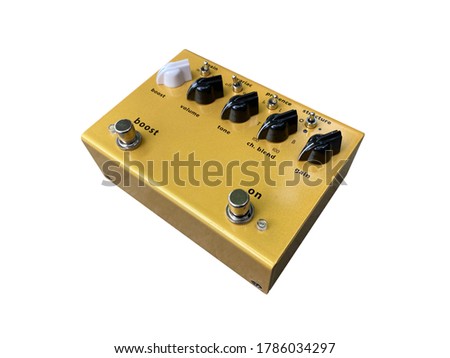 Isolated Gold overdrive stompbox electric guitar effect for studio and stage performed on white background with clipping path. side view photo. music concept.