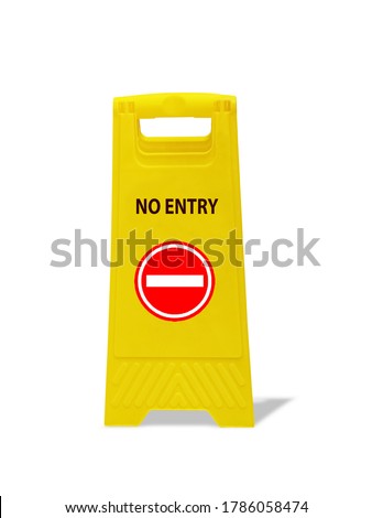 "NO ENTRY" sign in black text with red circle icon on the yellow object. Warning sign on the floor isolated on white background with shadow and clipping path.