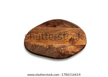 One wooden brown and orange oval cutting board on isolated white background. Table setting concept