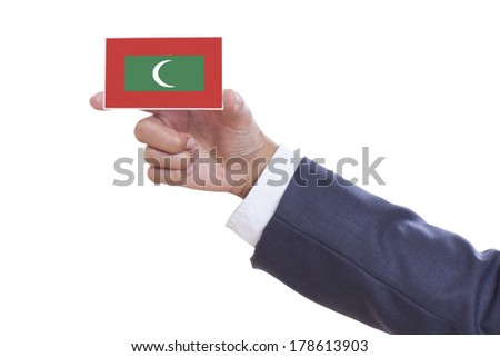 Businessman holding a business card with Maldives Flag 
