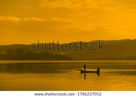 Early Morning fishermen on boat
