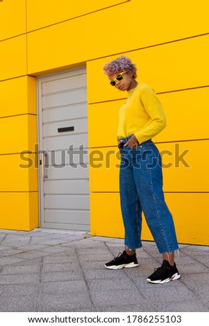 fashionable young woman in the city outdoors