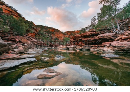 Sunset at the Z-Bend Gorge in Kalbarri, Western Australia, Australia. Royalty-Free Stock Photo #1786328900
