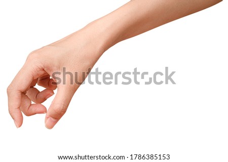 Close up hand holding something like a bottle or can isolated on white background with clipping path. Royalty-Free Stock Photo #1786385153