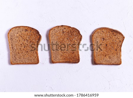 Crispy toasted bread for toast on white background