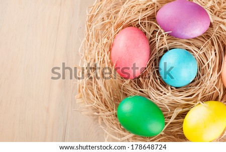 colorful easter eggs on a wooden background