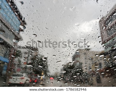 Rainy day in Bangalore with windshield as background