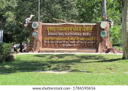 The sign shows entry to the national park, Khao Yai National Park and the Department of National Parks, Wildlife and Flora of Thailand.
