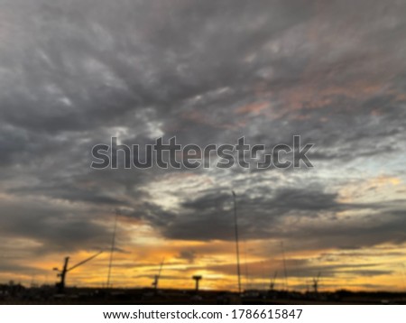 Blur picture  of sunset sky of shipyard