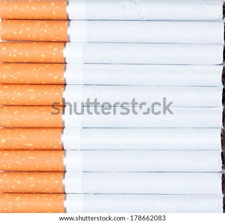 Cigarette close-up, background Royalty-Free Stock Photo #178662083