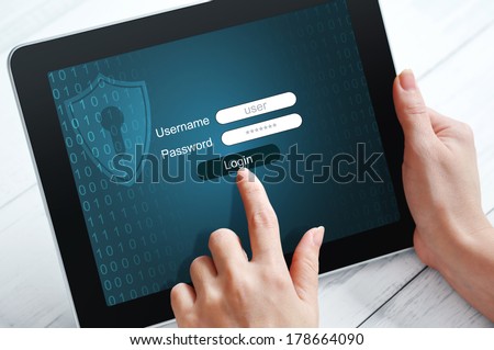 Female hands using tablet pc protected with password Royalty-Free Stock Photo #178664090