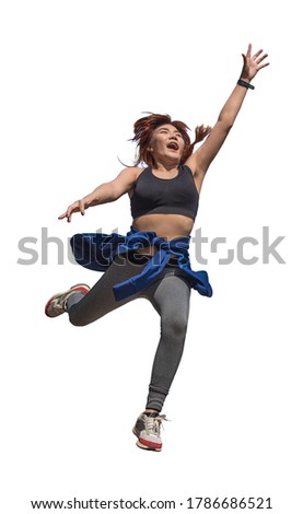 The girl jumps on the white background