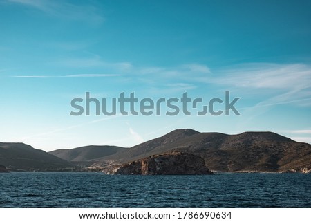 Beautiful Greek island landscape. View from a ferry tour around the Mediterranean.