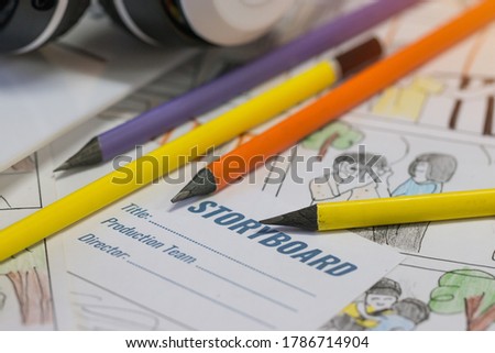Storyboard Video for Pre-production on film movie concept, Color pencil drawing on sketch board sequence template with headphone coffee cup on desk office,Behind process design creative in studio
