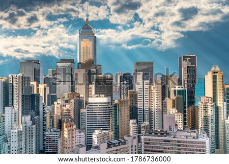The amazing view of Hong-Kong cityscape full of skyscrapers from the rooftop.