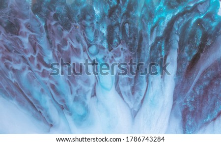 Original color epoxy resin texture. Abstract art background. close up photo art for your design project. Painting can be used as a trendy background for wallpapers, posters, cards, websites.