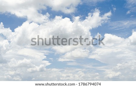 beautiful blue sky and white fluffy cloud horizon outdoor for background.