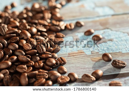 Close up roasted coffee beans on  table and copy space.