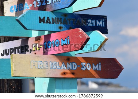 Colorful sign with directions, New York