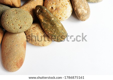 Stones/ rocks, pebbles collection in white background, zen and meditation, abstract, ancient concept, Boho style, Bohemian background, vintage, memory, geographical rocks