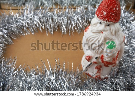 Santa Claus is the main symbol of the New Year holidays. Abstract Christmas background, selective focus.