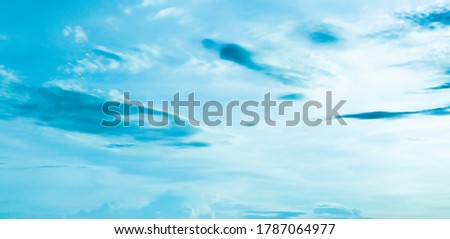 Beautiful blue sky and white clouds of various shapes with sunlight. Nature background Royalty-Free Stock Photo #1787064977