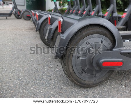 Electric urban transportation: the row of electric scooters 