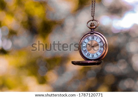 close up pocket watch with nature copy space background for text, saving and manage money to success business, relaxation and lifestyle concept