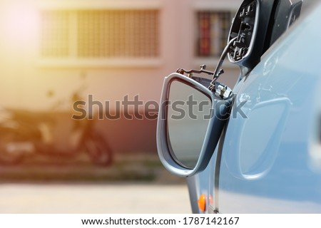 Close up car wing mirror, side view mirror broken from accident. Car insurance concept. Royalty-Free Stock Photo #1787142167