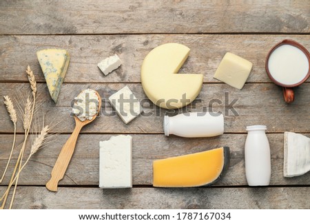 Different dairy products without lactose on wooden background Royalty-Free Stock Photo #1787167034