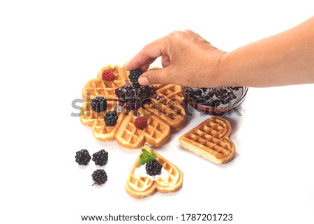 Girl served waffles with blueberry jam, Breakfast with coffee. White background, top view, close up