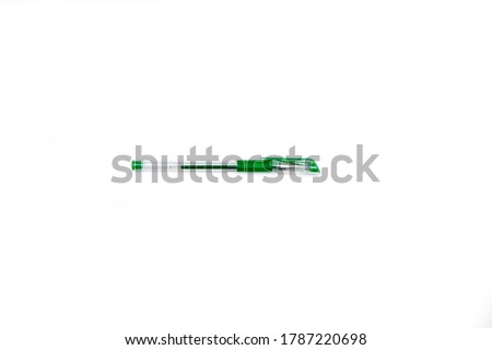 green pen insolated on white background