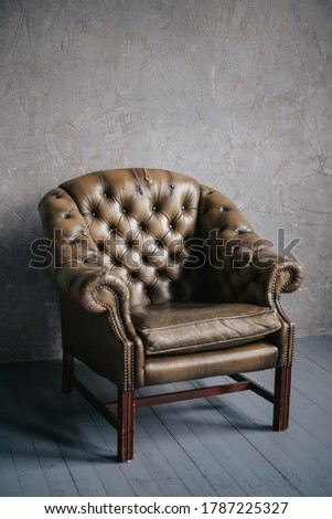Classic yellow leather armchair isolated on white background with clipping path