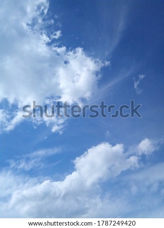 clouds in the blue sky on a sunny summer day