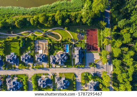 Aerial View of luxury homes Properties. Taken during a sunny summer day.