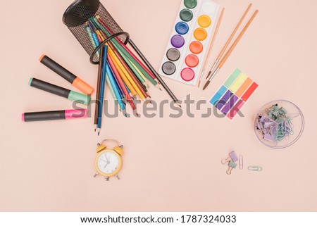 Back to school, school items, pencils, felt-tip pens, paints on the table, getting ready to study, knowledge day, study well, education concept, distance learning