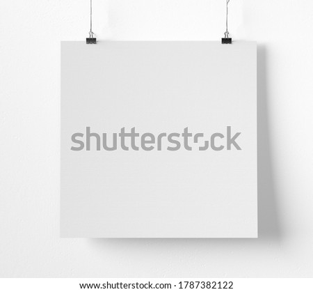 Square hanging poster mockup isolated.